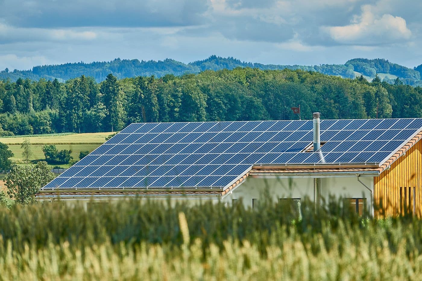 Solar photovoltaic panels installed across a home roof.